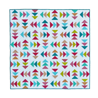 Blessings Quilt Pattern (Download) by Homemade Emily Jane showing a colorful modern geometric quilt with repeated arrow and triangle motifs on a light background
