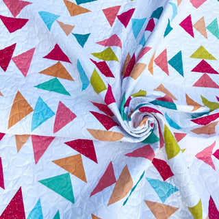 Blessings Quilt Pattern (Download) by Homemade Emily Jane featuring a colorful geometric quilt with vibrant triangular shapes on a white background