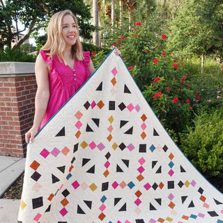 Keystone Quilt Pattern (Download) by Homemade Emily Jane featuring a modern geometric quilt with balanced symmetry and colorful diamond and triangle shapes