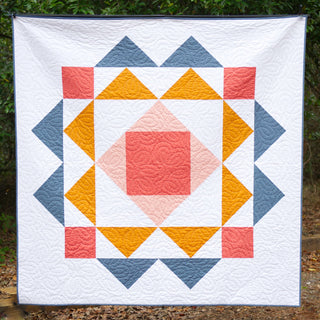 Paradigm Quilt Pattern (Download) modern geometric quilt in coral mustard and blue with intricate quilting by Homemade Emily Jane