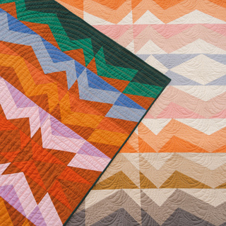 Colorful Rocky Coast quilt by Toad & Sew with geometric pattern on a white background