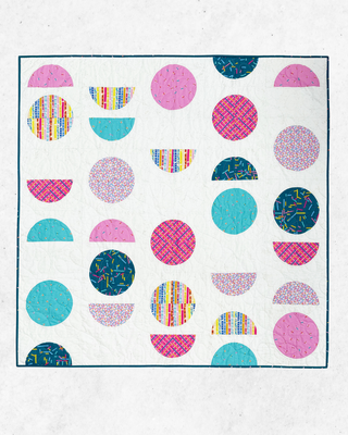 Spring Moon quilt by Lou Orth Designs on a white background