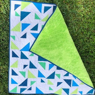Triangular Quilt Pattern (Download) by Homemade Emily Jane featuring bold geometric triangle shapes in blue green and white for modern quilting