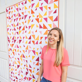 Triangular Quilt Pattern (Download) featuring a colorful modern geometric quilt with dynamic triangle shapes by Homemade Emily Jane