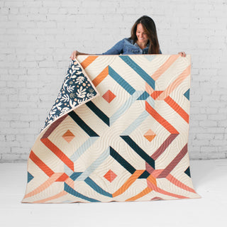 Villager Quilt by Eudaimonia Studio Cover Artist Holding