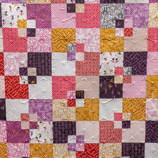 Welcome Party quilt by Trace Creek Quilting with various patterns and colors
