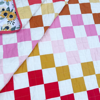 Doubled Up Quilt Pattern (Download) by Homemade Emily Jane featuring colorful geometric quilt blocks in pink red gold orange and white for modern quilting