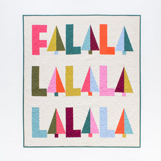 Fa-La-La Quilt Pattern (Download) by Patternly Collective featuring a colorful holiday quilt with repeated Fa La La lettering and festive geometric shapes
