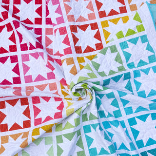 Keepsake Quilt Pattern (Download) by Homemade Emily Jane featuring colorful modern star quilt blocks in red pink yellow green and blue tones