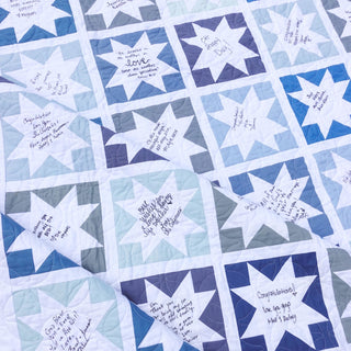 Keepsake Quilt Pattern (Download) by Homemade Emily Jane, a modern blue and white Sawtooth Star quilt with handwritten messages in each star block
