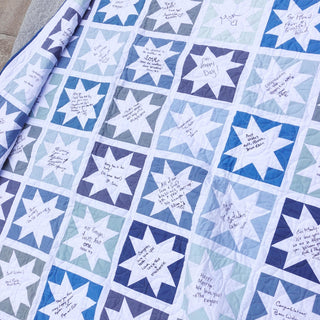 Keepsake Quilt Pattern (Download) by Homemade Emily Jane, a modern star quilt with blue and white blocks featuring handwritten messages and dedications