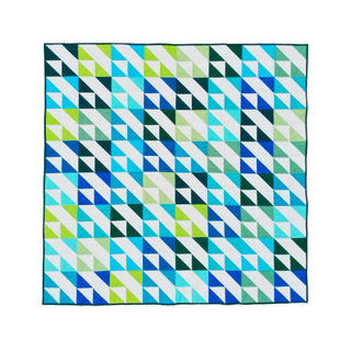 Kinetic Quilt Pattern (Download) by Homemade Emily Jane featuring a bold modern geometric quilt design with energetic blue green white and teal triangle blocks