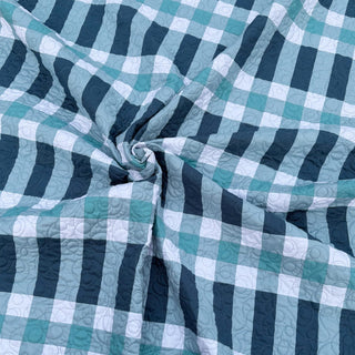 Linear Quilt Pattern (Download) by Homemade Emily Jane featuring a modern quilt in teal navy and white with bold geometric stripes and soft folds