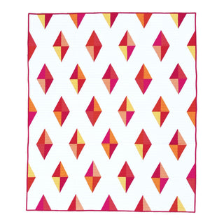 Luminary Quilt Pattern (Download) by Homemade Emily Jane featuring colorful geometric diamond shapes on a crisp white quilt background
